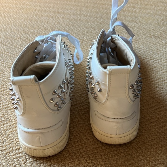 Christian Louboutin White with silver spikes high top sneakers. - Picture 4 of 5